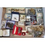 Box of assorted costume jewellery to include: choker and other necklaces, brooches, bracelets,