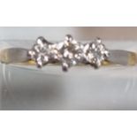 18ct gold diamond three stone ring. 1.7g approx. Size N1/2. (B.P. 21% + VAT)