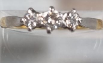 18ct gold diamond three stone ring. 1.7g approx. Size N1/2. (B.P. 21% + VAT)