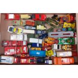 Three trays of assorted playworn and boxed diecast and other model vehicles including: