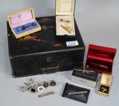 Japanese lacquered workbox, the interior revealing assorted items including: various cufflinks in