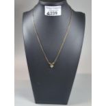 9ct gold chain with small pendant. 5g approx. (B.P. 21% + VAT)