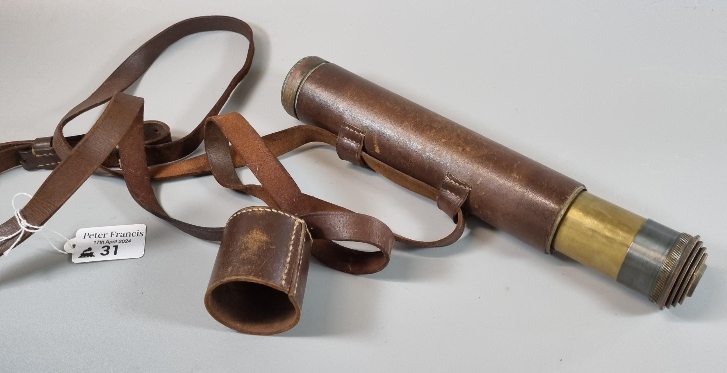 British Military three draw brass telescope with leather strap and mount, marked 'J Lizars Ltd,