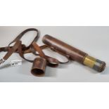 British Military three draw brass telescope with leather strap and mount, marked 'J Lizars Ltd,