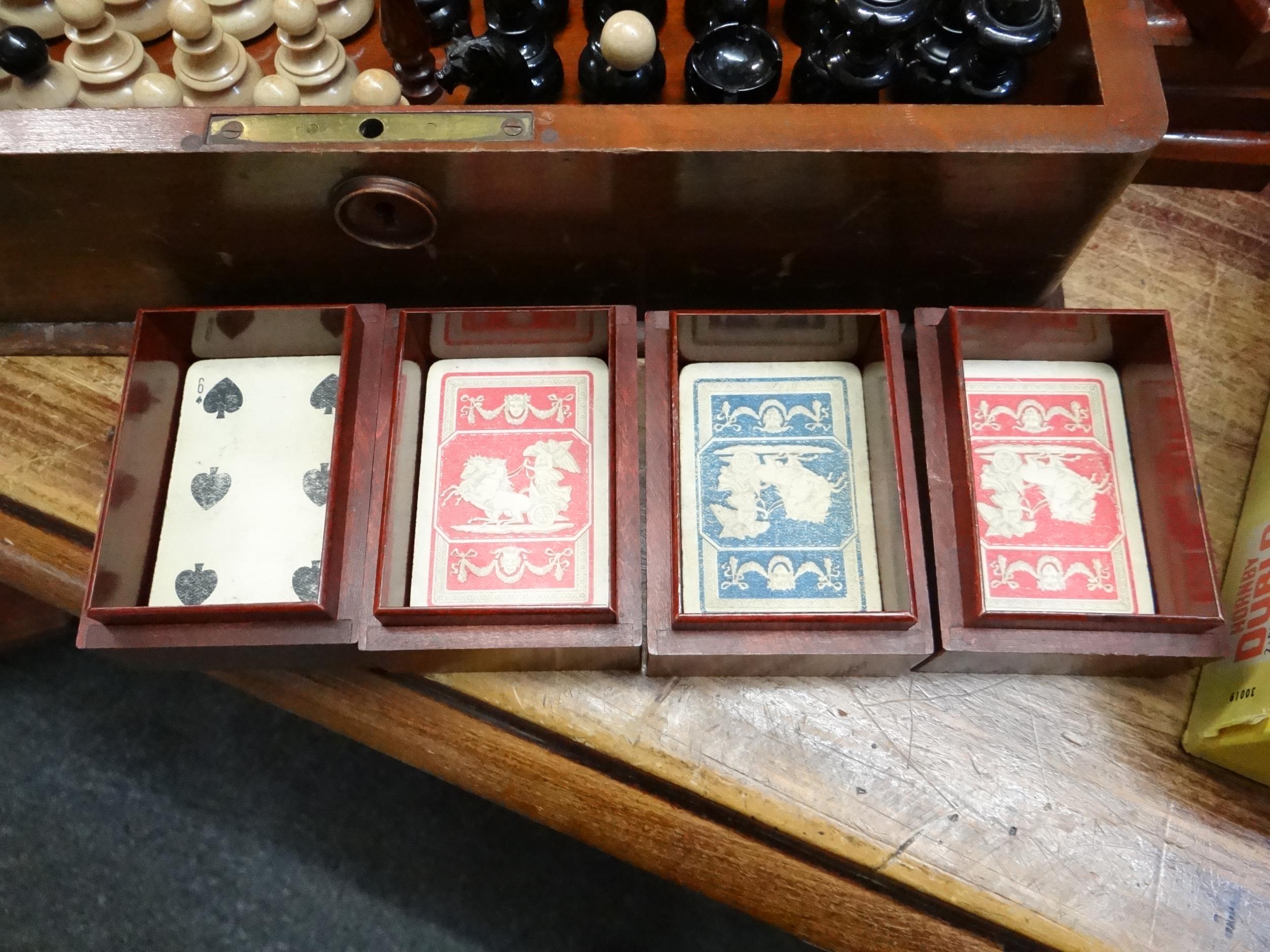 Early 20th century mahogany games compendium, the box containing various chess pieces, card boxes - Image 5 of 11