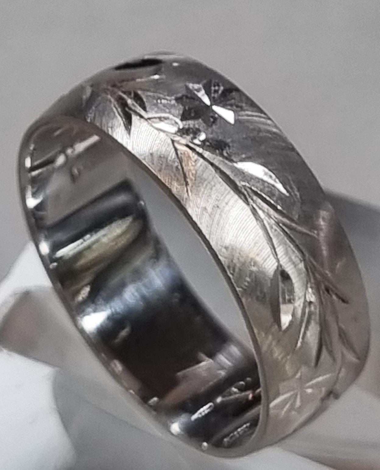 18ct white gold engraved wedding band. 3.7g approx. Size K. (B.P. 21% + VAT) - Image 2 of 4