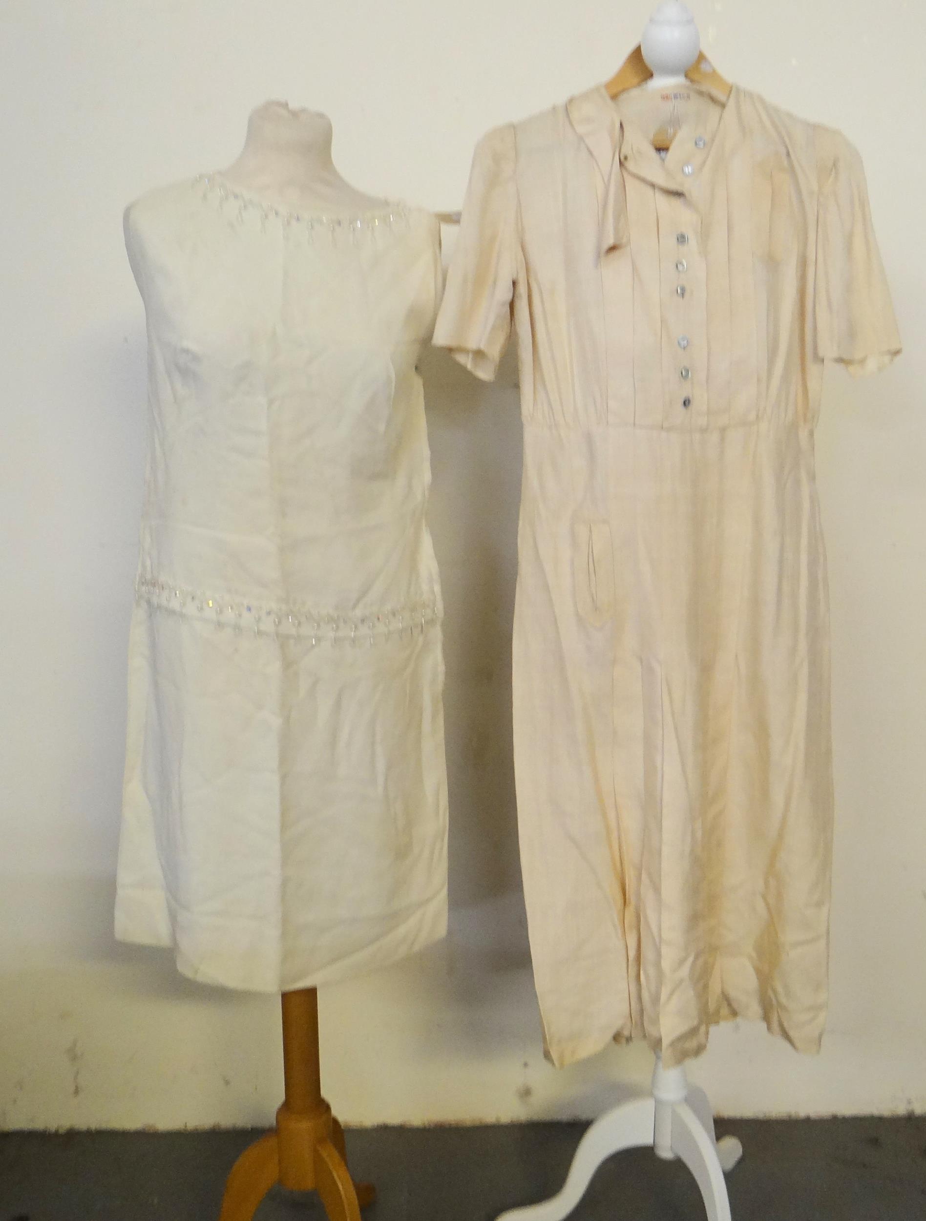 Two vintage dresses; one Austrian silk (probably 1940's) with pleated skirt by Wien and a cream