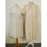 Two vintage dresses; one Austrian silk (probably 1940's) with pleated skirt by Wien and a cream