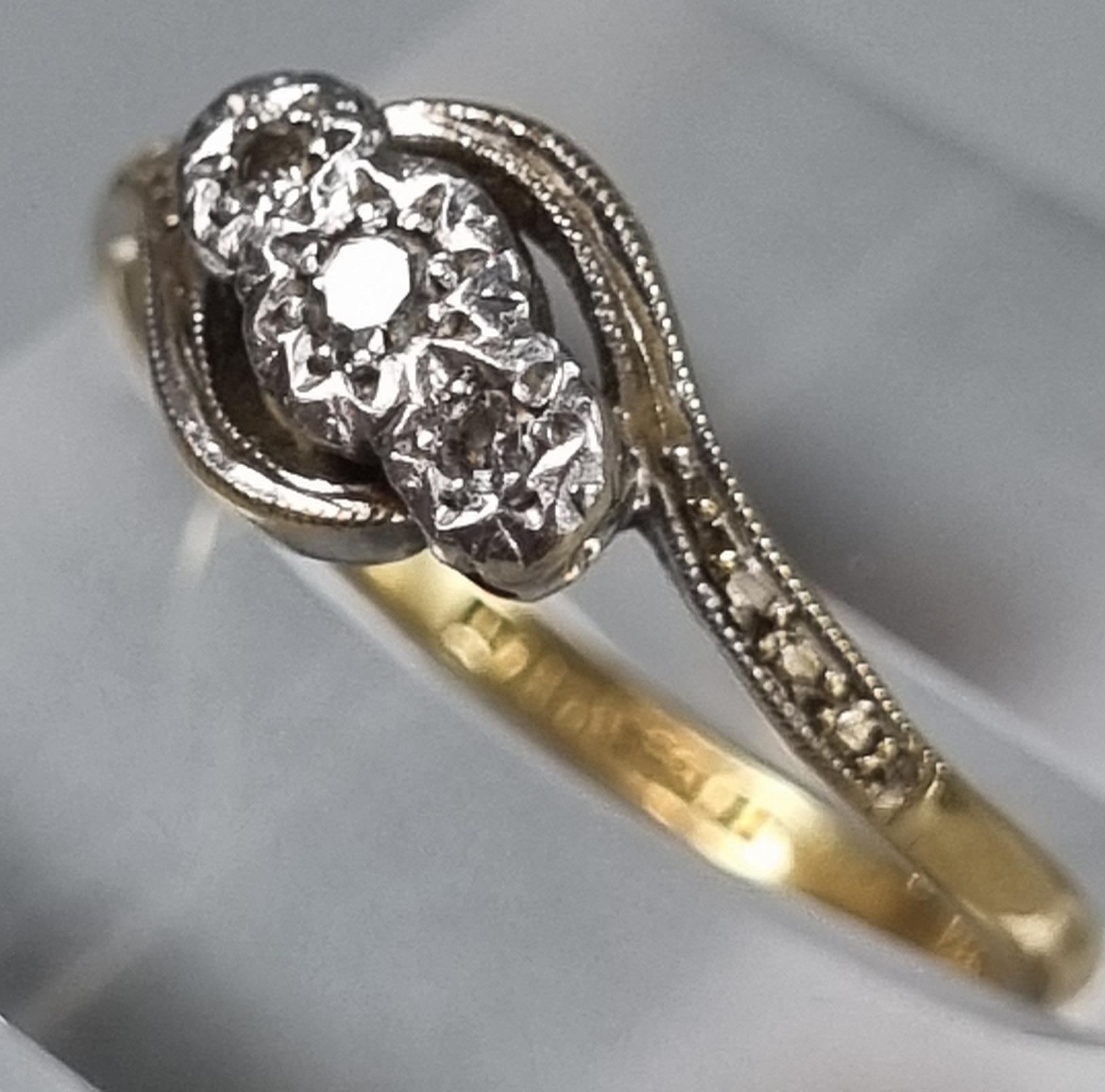 18ct gold and platinum twist shank three stone diamond ring. 2.4g approx. Size L1/2. (B.P. 21% + - Image 2 of 4