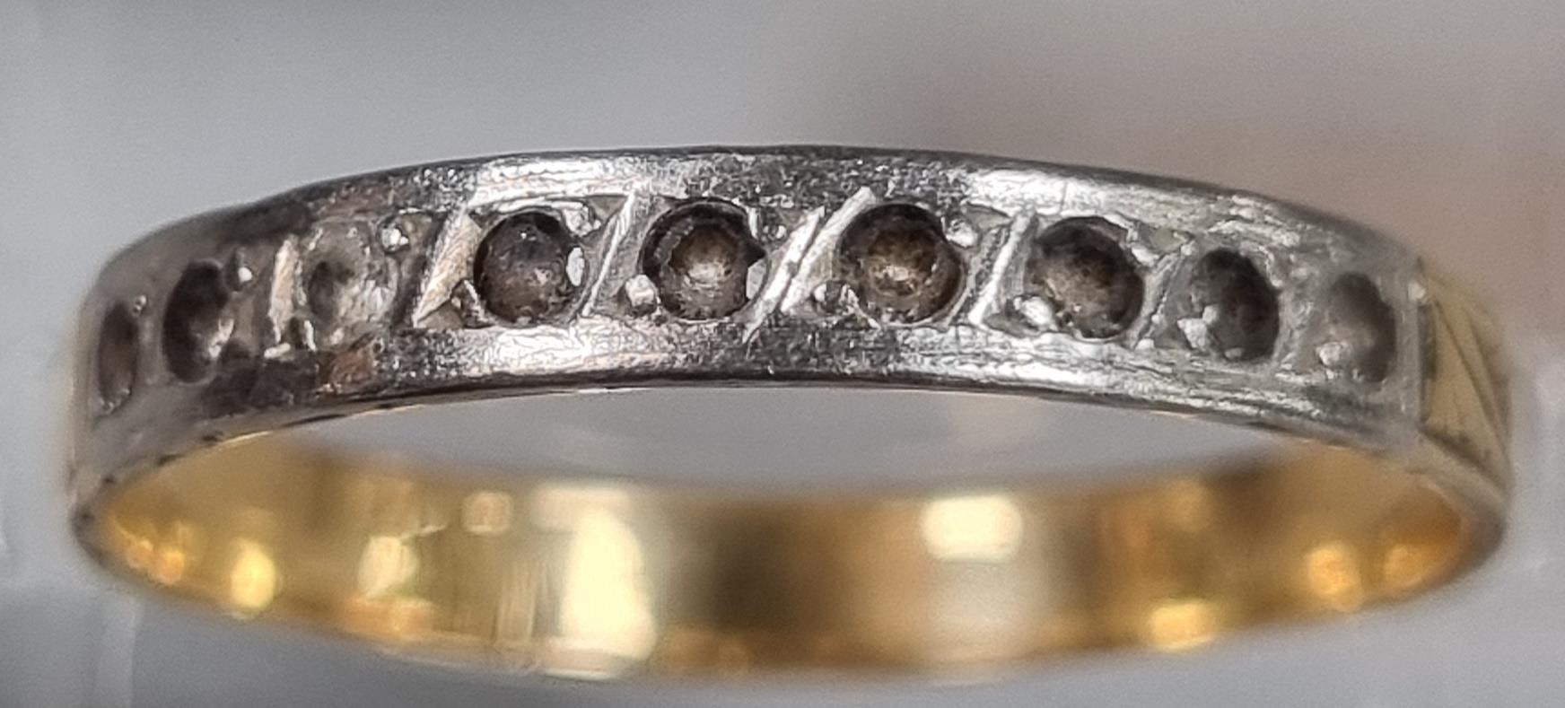 Yellow metal engraved half eternity style ring. 2g approx. Size P. (B.P. 21% + VAT)