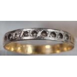 Yellow metal engraved half eternity style ring. 2g approx. Size P. (B.P. 21% + VAT)