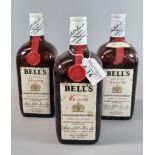 Three bottles of Bell's Royal VAT De Luxe Liqueur Blended Scotch Whisky. 70% proof. (B.P. 21% + VAT)