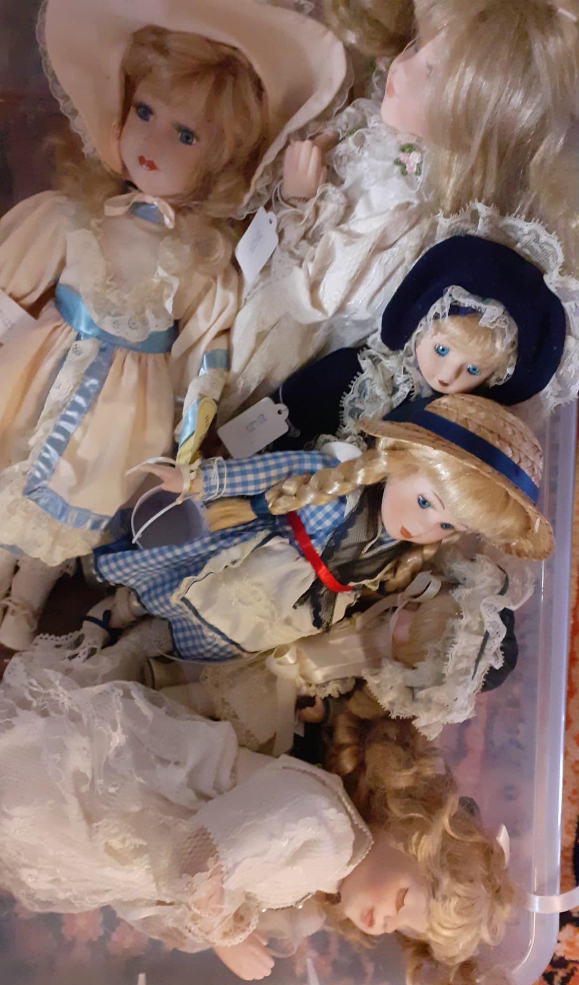 Two boxes of modern Leonardo and other dolls in fitted clothing. (B.P. 21% + VAT)