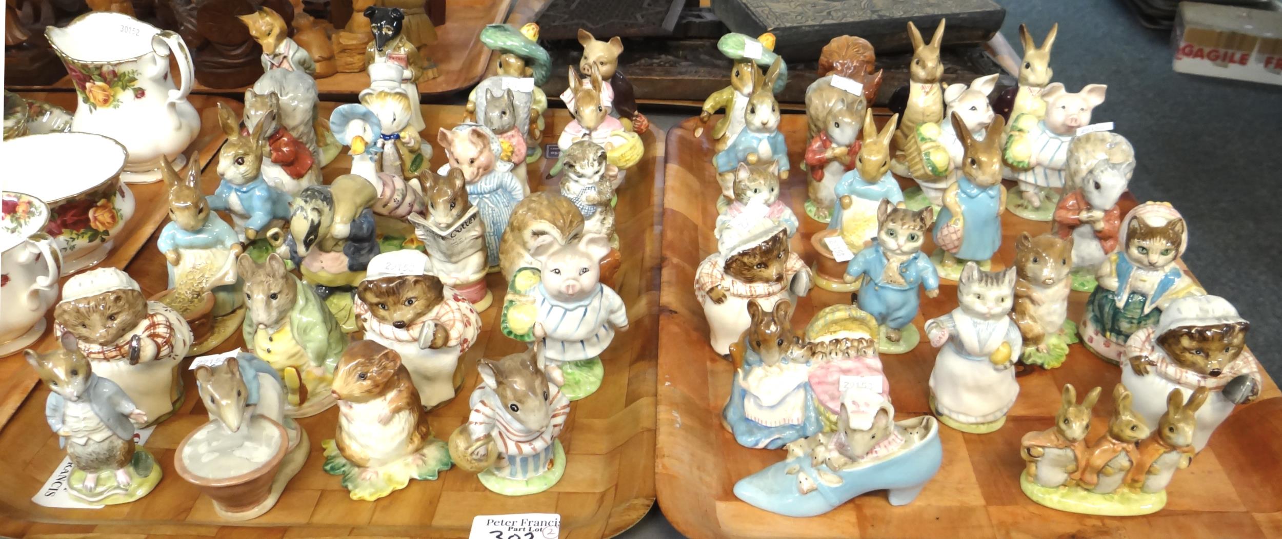 Two trays comprising forty five Beswick Beatrix Potter figures with printed gold marks to bases to