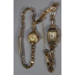 Two ladies' 9ct gold dress watches, both having gold plated bracelets. 21g overall approx. (2) (B.P.