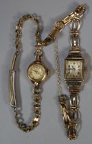 Two ladies' 9ct gold dress watches, both having gold plated bracelets. 21g overall approx. (2) (B.P.