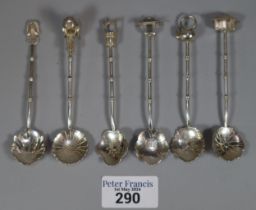 Set of Oriental 950 silver spoons, all with decorative terminals in the shape of rickshaw, kettle,