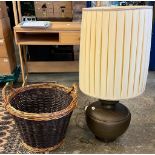 Two handled wicker basket together with a bronzed metal baluster table lamp with shade. (B.P.