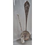 Religious continental silver spoon with coin bowl. 1.3 troy oz approx. together with a miniature