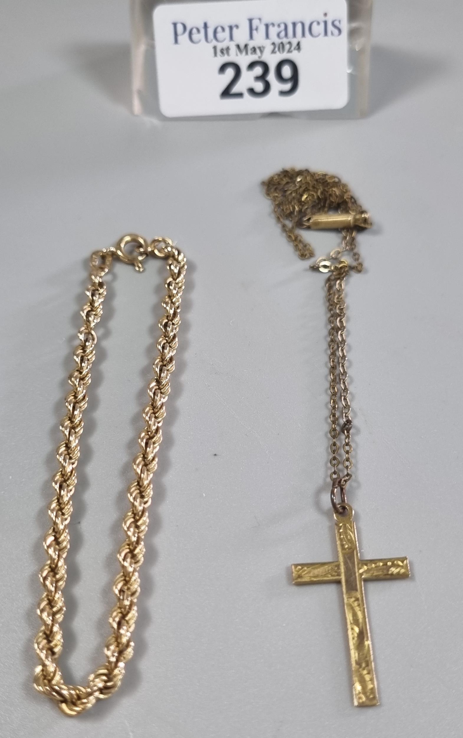 9ct gold rope twist bracelet. 2.2g approx. together with a 9ct gold crucifix pendant and plated