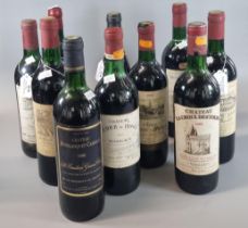 Collection of ten bottles of mainly French red wine to include: Chateaux Du Bois De La Garde 1984,