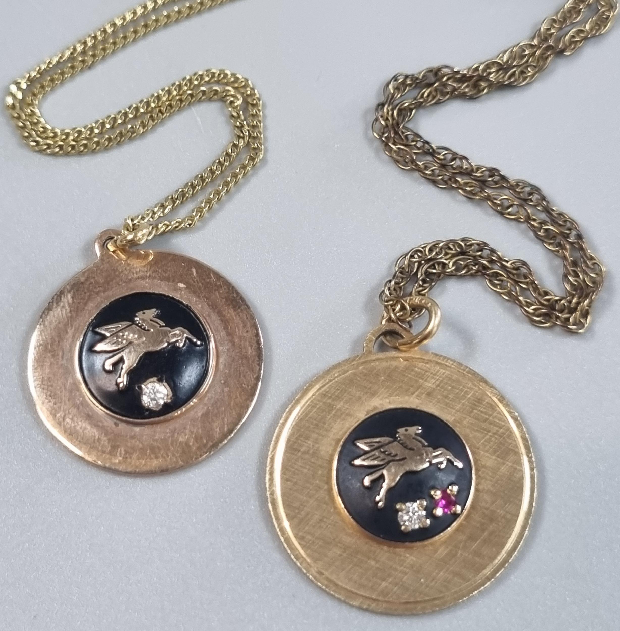 Two similar unusual 10K gold circular pendants with Pegasus horse, ruby and diamonds, both on yellow - Image 2 of 3