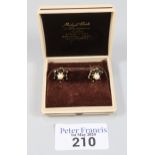 Pair of 9ct gold pearl and sapphire flowerhead rings. 2.6g approx. (B.P. 21% + VAT)
