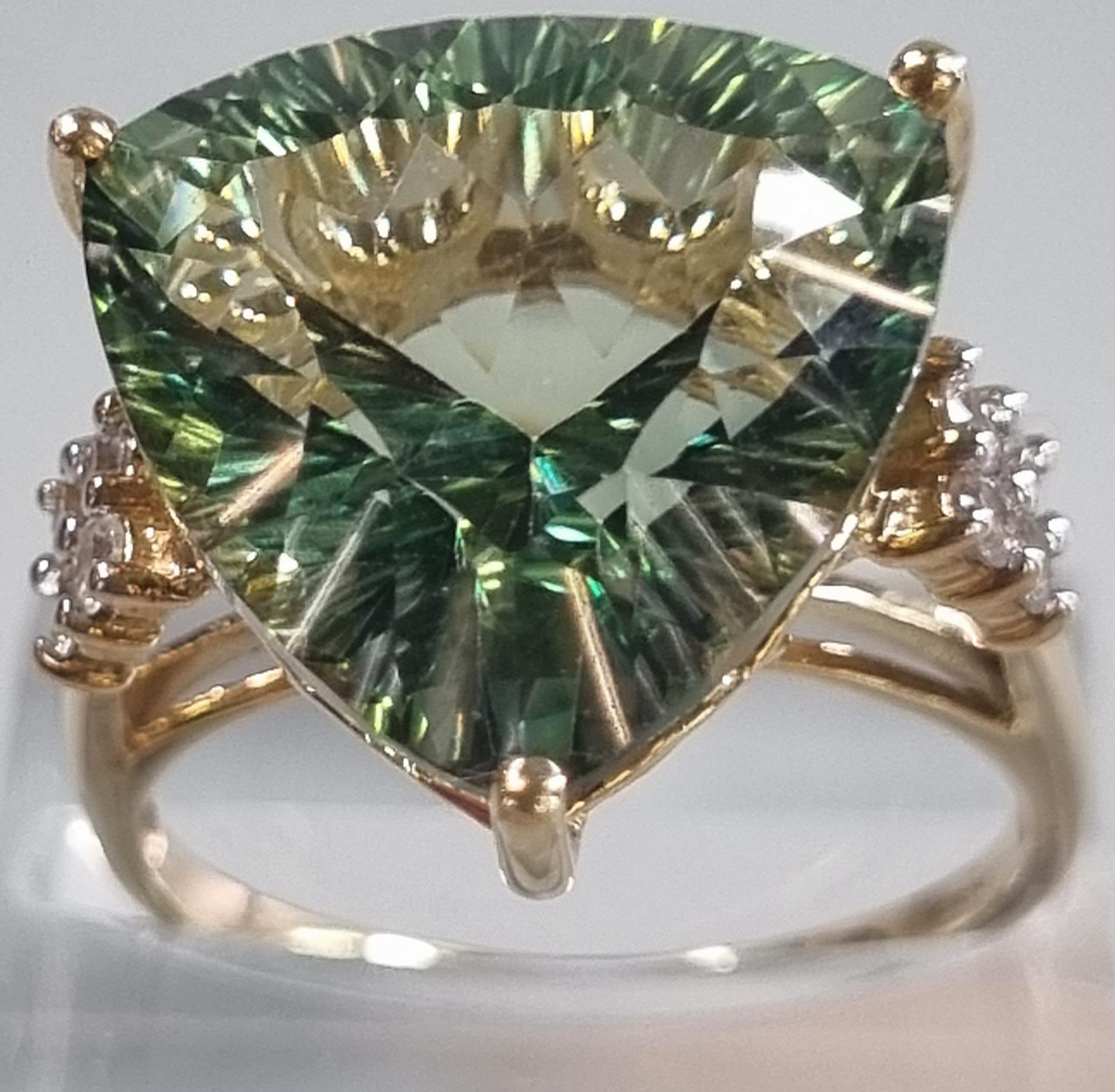 9ct gold 'Kiwi' green topaz and white sapphire ring. Sri Lankan origin. 14.275 carat weight. Size R.