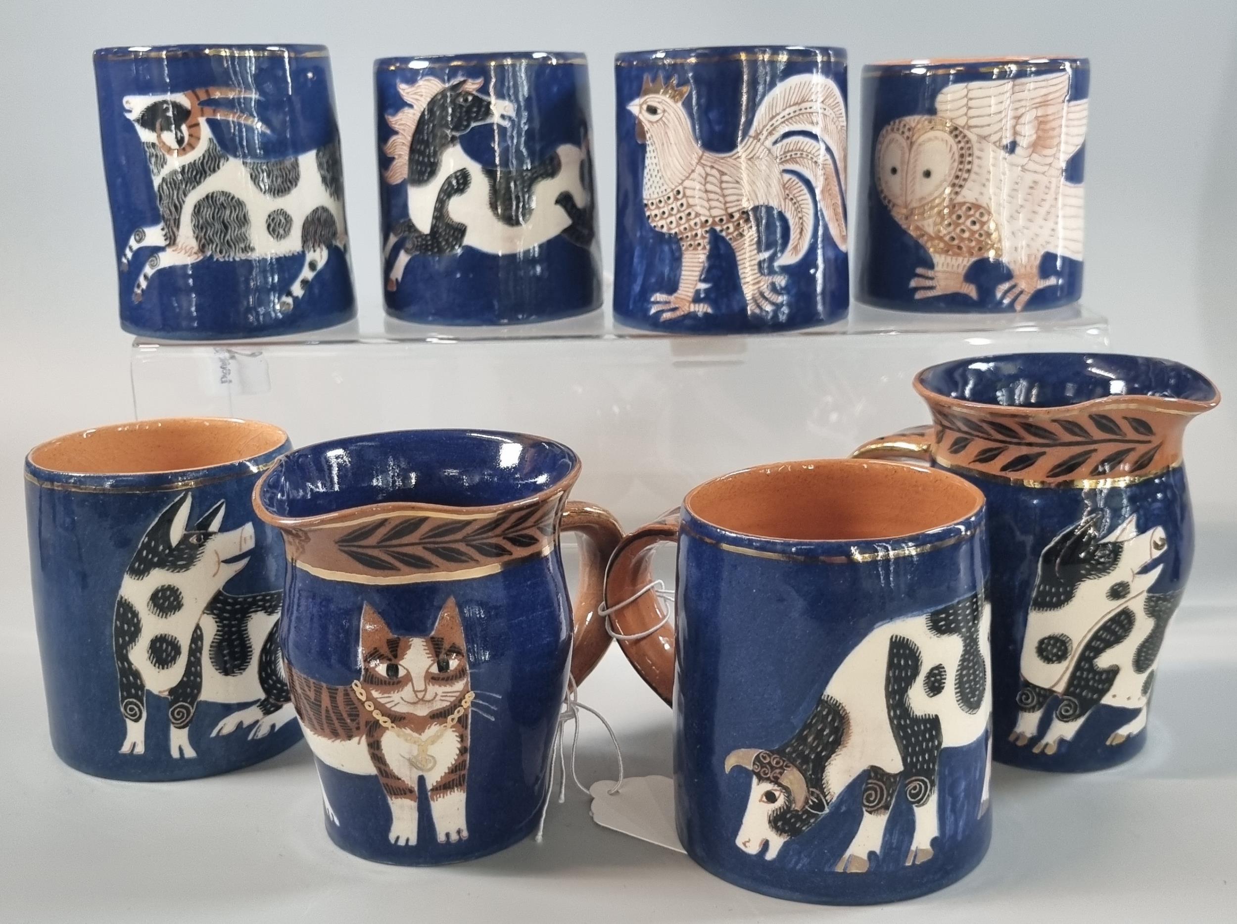 Salley Seymour (Penfro), collection of Welsh studio pottery: cups/mugs, depicting owl, cat, pigs,