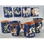 Salley Seymour (Penfro), collection of Welsh studio pottery: cups/mugs, depicting owl, cat, pigs,