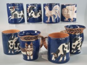 Salley Seymour (Penfro), collection of Welsh studio pottery: cups/mugs, depicting owl, cat, pigs,