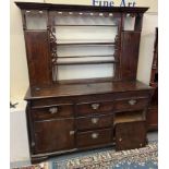 Part 18th century oak two stage dresser, the base probably originally a coffer. (B.P. 21% + VAT)