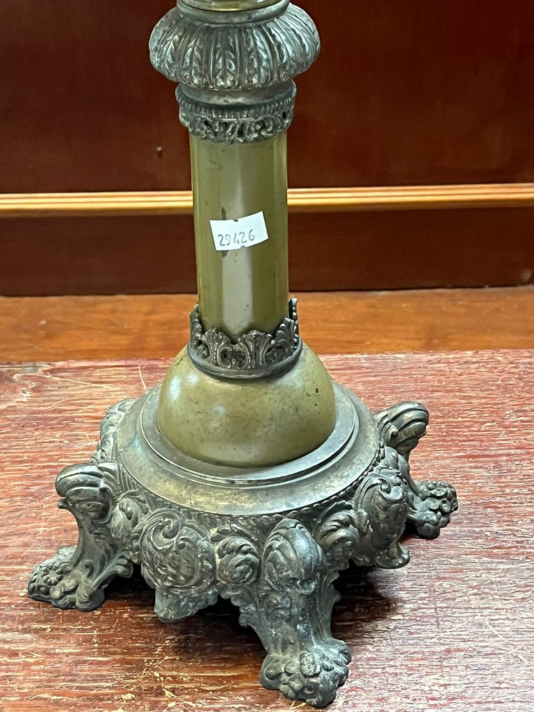 Early 20th century oil burner lamp having green and clear glass shade above a brass repoussé - Image 3 of 4