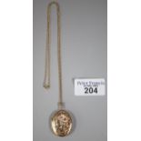 9ct gold gold engraved locket on a 9ct gold fine link chain. 8.4g approx. (B.P. 21% + VAT)