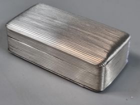 19th century, probably Dutch, ribbed silver snuff box of rectangular from with hinged cover. 1