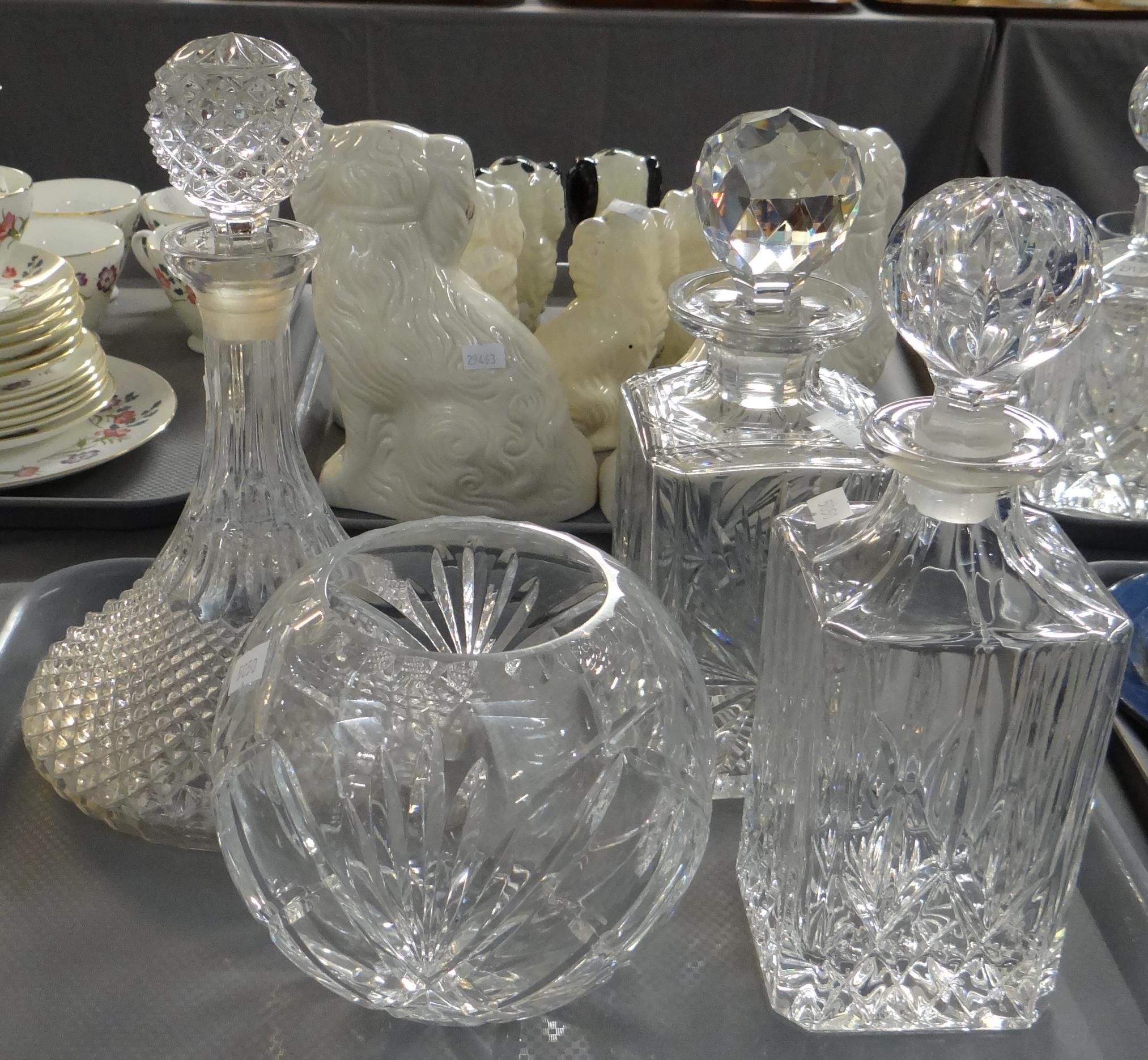 Tray of glassware to include: two spirit decanters, a crystal ship's decanter and a spherical