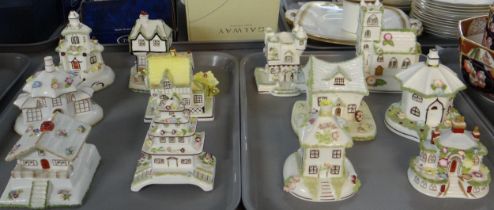 Two trays containing twelve Coalport fine English bone china building ornaments to include: 'Swiss