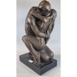 Modern bronzed composition study of two nude figures in an embrace on rectangular base. 50cm high