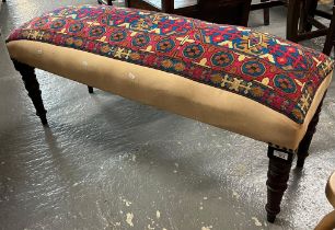 Victorian rectangular stool with later multi-coloured geometric and floral upholstery on baluster