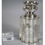 Continental white metal canister/flask, the body with engraved floral and foliate decoration,