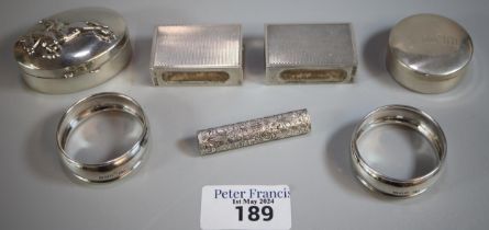 Box of silver to include: two napkin rings, two silver boxes one decorated with jockey and