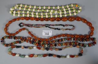 Bag of necklaces to particularly include: an amber coloured necklace. (B.P. 21% + VAT)