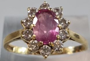 18ct gold pink stone and diamond cluster ring (possibly sapphire). 3.1g approx. (B.P. 21% + VAT) The