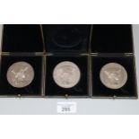 Group of three Royal Academy of Arts bronze medallions, each marked to the rim 'James Rutherford for