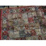 Persian Kashmir full pile rug with multi-coloured garden panel designs. 230 x 160cm approx. (B.P.