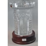 Kilkenny Crystal, Irish glass vase in the form of a turret on wooden stand. The vase 31cm high