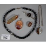 Box of silver and Scottish agate jewellery to include: pendant brooch, bullseye necklace, agate