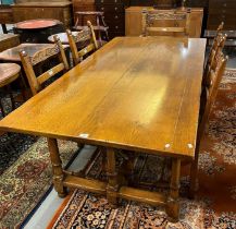 Tudor Oak Furniture, a good quality oak dining table on baluster turned legs and central and side