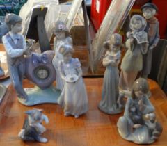 Tray of Spanish porcelain Lladro figures to include: 'Time for Love' figure group with clock, '
