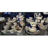 Two trays of 19th Century Gaudy Welsh 'Floret' design teaware to include: teapot, plates, jug,